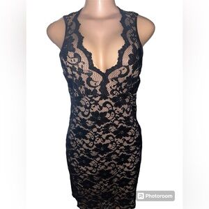 Karen Kane cocktail dress tailored fit in a size medium. Black lace dress